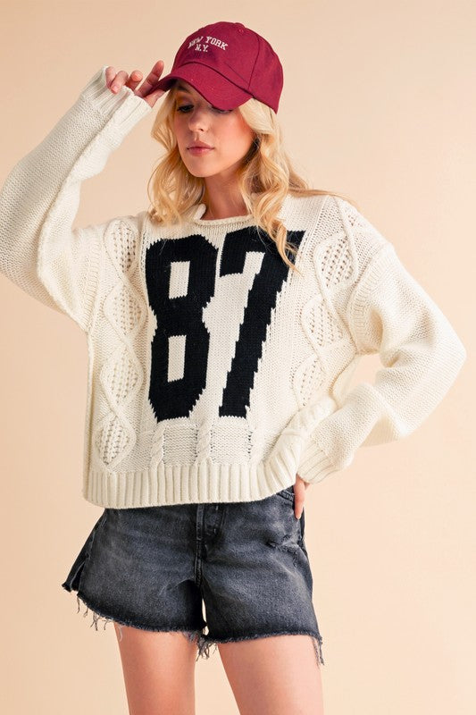 Aemi+Co Contrast Number Cable Knit Drop Shoulder Sweater